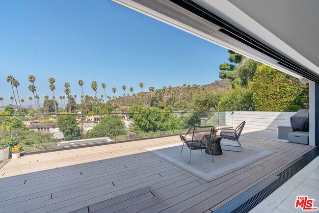 Building Photo - 5265 Dahlia Dr