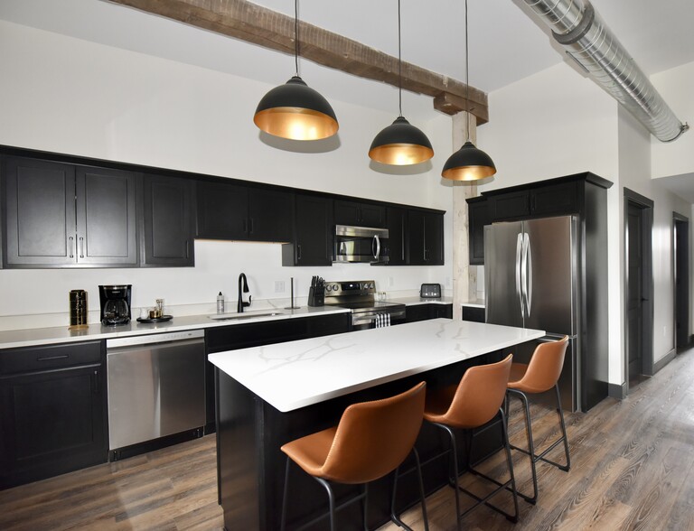 Fully furnished kitchen with all brand new appliances and all necessary kitchen supplies/essentials. - 101 W Broadway St