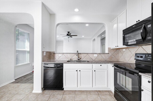 Building Photo - ***MOVE-IN SPECIAL: ONE WEEK FREE***Luxurious Move-In Ready Home with Versatile Living Spaces