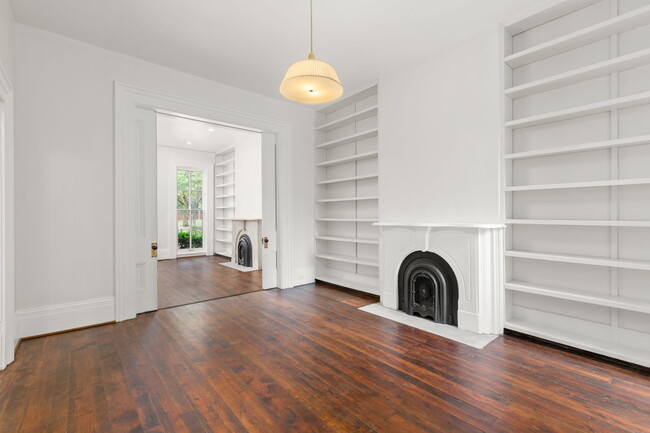 Dining room with modern fixture &shelving - 916 Hickory St