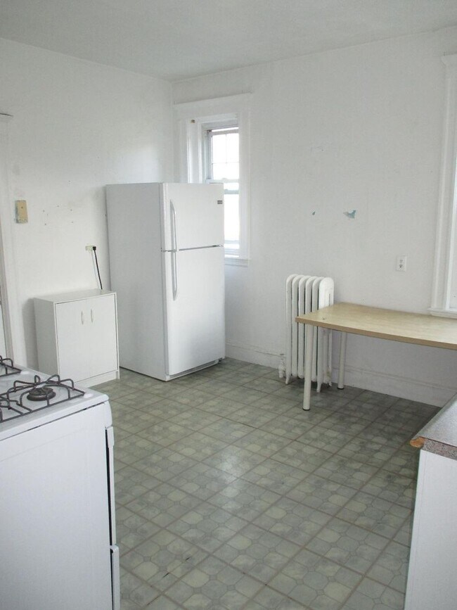 Building Photo - No brokers Fee, No Security Deposit, Heat, Hot Water Included, Steps from the T Stop
