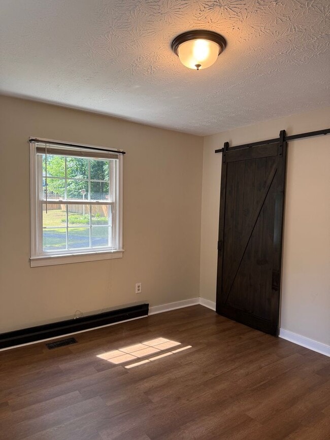 Building Photo - 2 Bedroom 1 Bath Rancher with Incredible Yard & Bonus Spaces