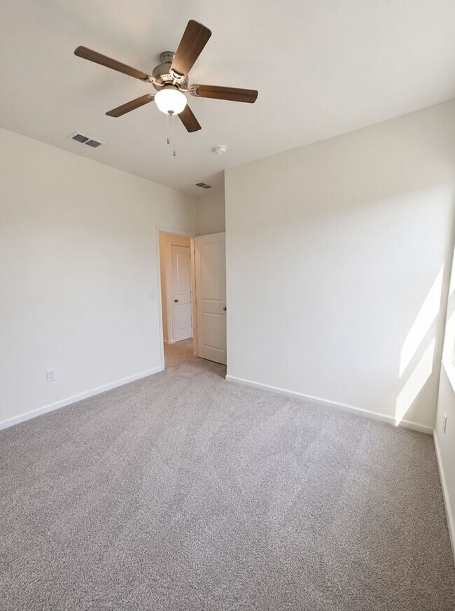 Building Photo - Be the First to Call This Brand-New Pond View Home Yours!