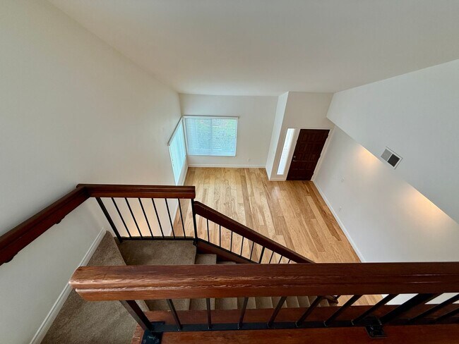 Building Photo - Spacious 4 Bedroom House with Large Fenced Yard! Landscaping Included! Two Car Garage!