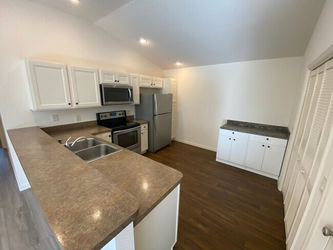 Building Photo - Resort Living in This UNFURNISHED Annual Rental in The Village of Fenny, Patio Villa, 2 bed, 2 bath.