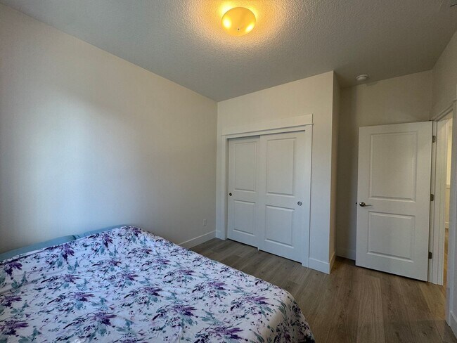 Building Photo - Modern and Immaculate 4-Bedroom Bethany Home with Designer Finishes and Fenced Yard