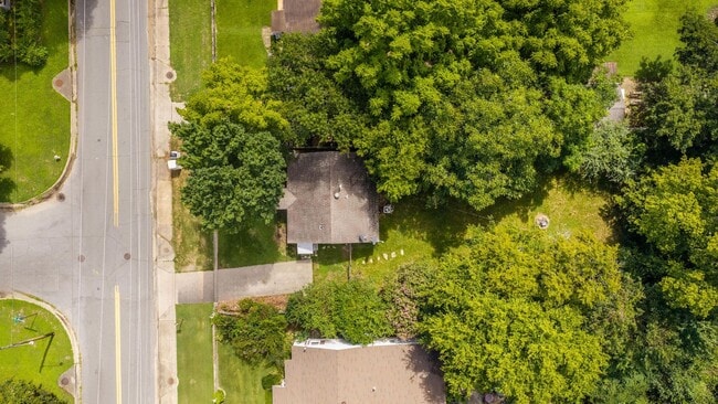 Building Photo - Charming 2BR/1BA Brick Cottage — Hardwoods, Fenced Yard, W/D Included