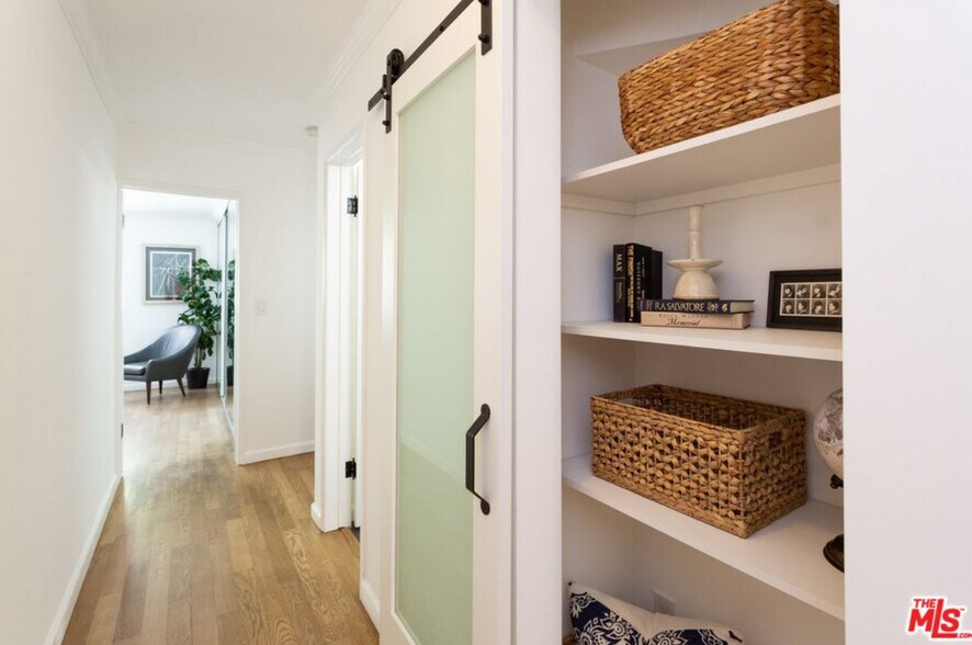 Hallway with barn door storage - 1037 18th St