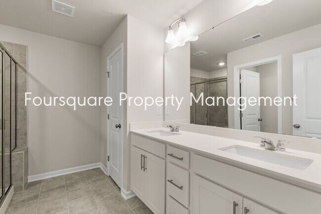 Building Photo - Coming Soon; July 27, 2026 : End unit ToSpacious End-Unit Townhome with 2nd Floor Loft, Screened-...