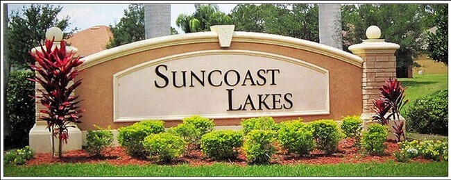 Building Photo - **SUNCOAST LAKES GATED COMMUNITY**