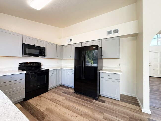 Building Photo - Spacious Garden Lakes Beauty – Vaulted Ceilings, 3-Car Garage & Stunning Upgrades!