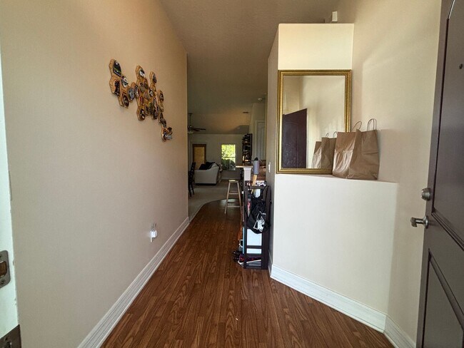 Building Photo - 4 BR 2 BA Annual Rental in Gated community...
