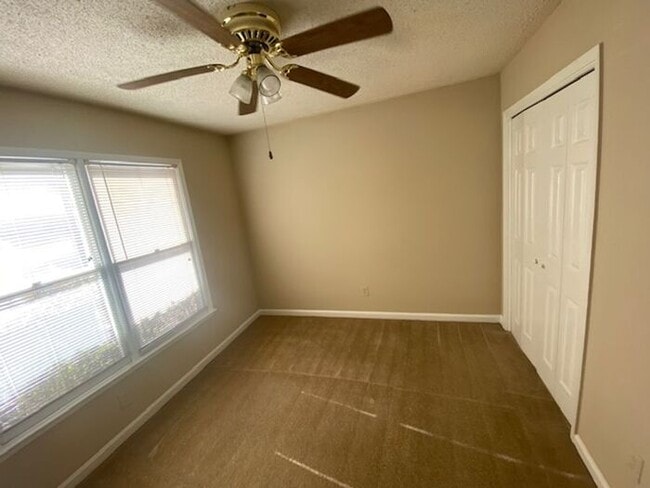 Building Photo - NOW AVAILABLE! Charming 2-Bedroom, 2-Bathroom Single-Level Townhome