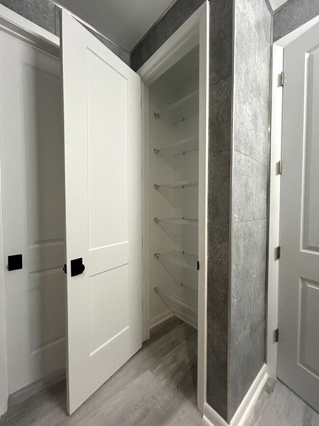 Building Photo - Industrial Style. Downtown Energy. Elevated Living.