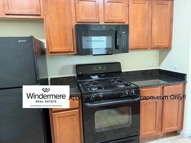 Building Photo - Absolute MUST See Condo In Immaculate Condition With Open Flowing Floor Plan!