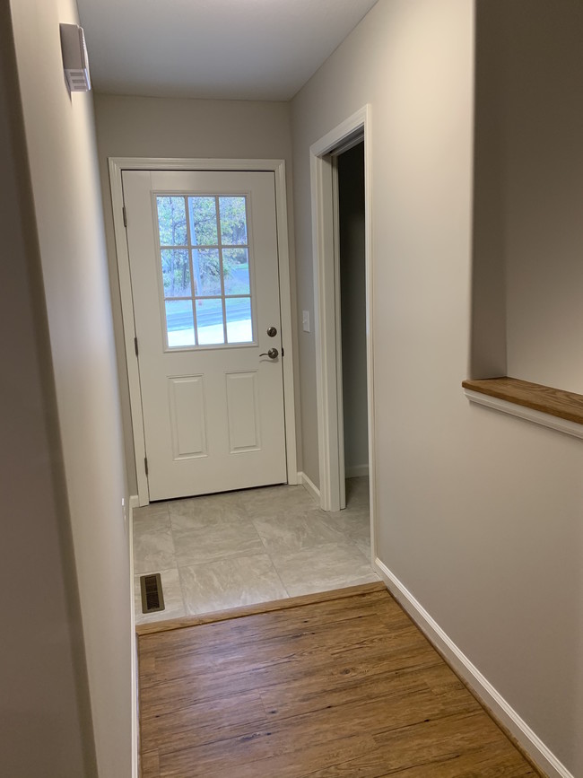 Front door, hall & entry closet - 6673 New Rd