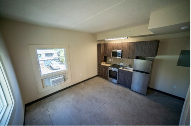 Building Photo - Convenient Cozy Studio Utilities Included