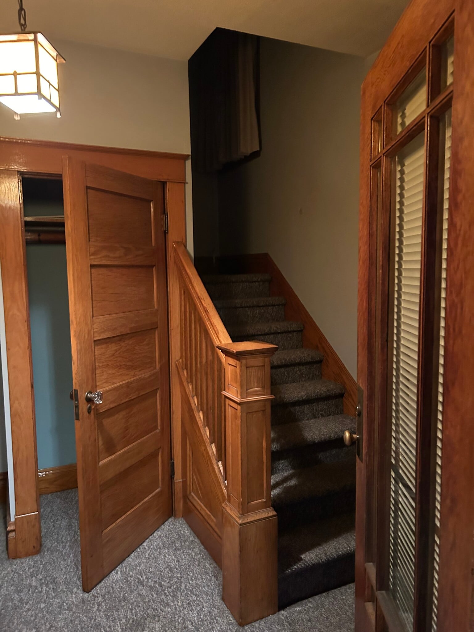 Classic craftsman entry with original hardwood moldings and trim. - 514 Electric Ave