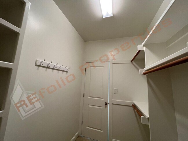 Building Photo - Elegant 3 Story 3 Bedroom Formal Model Tow...