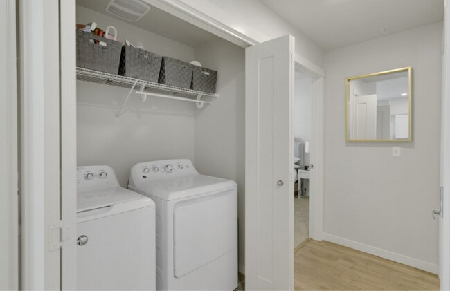 Building Photo - Modern Ground-Level Condo in River Terrace...