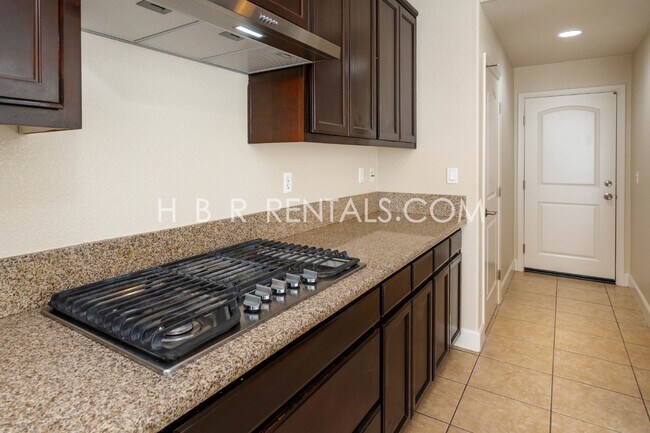 Building Photo - Spacious 4-Bed, 3-Bath Home with a Beautiful Garden in Mountain House! *FIRST FLOOR BEDROOM and F...