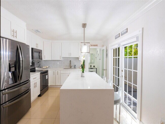 Building Photo - Northwest 58th Court, Miami, FL 33126 - 3 BR 2 BA single-family home