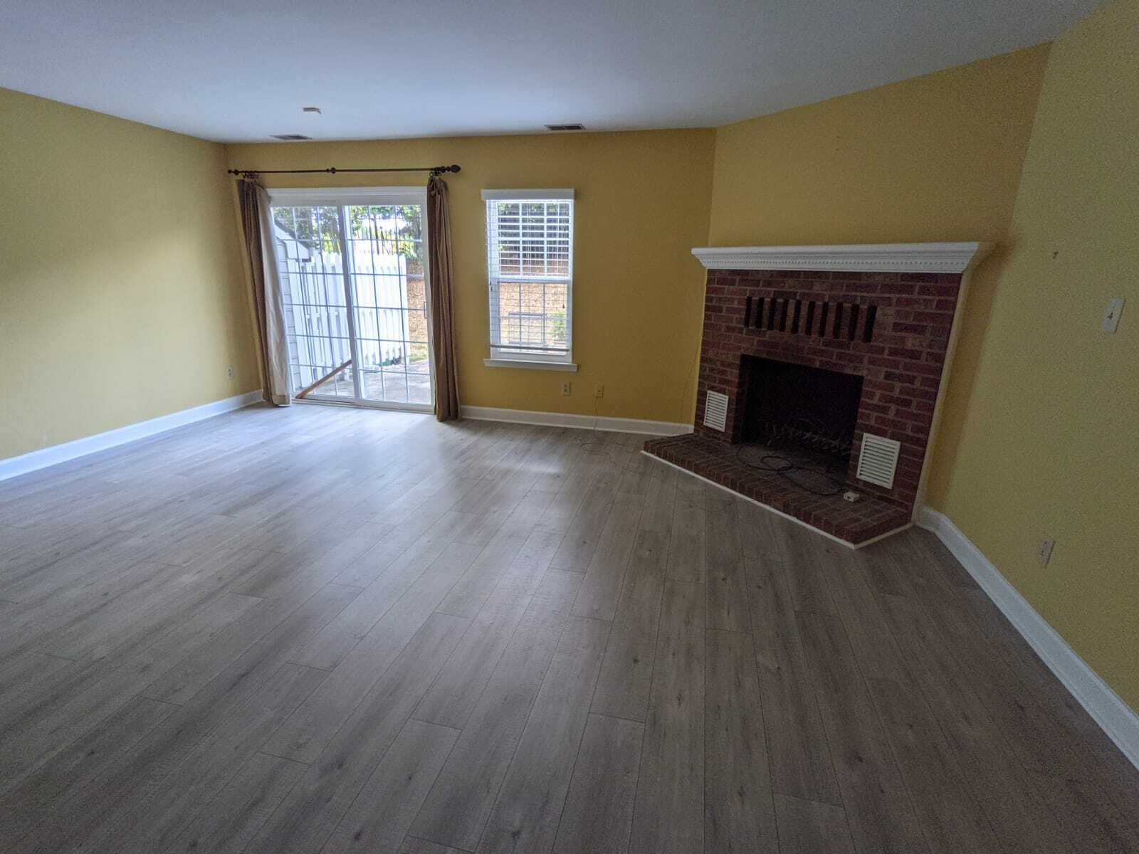 Living Room with new floors - 2719 New Hamlin Way