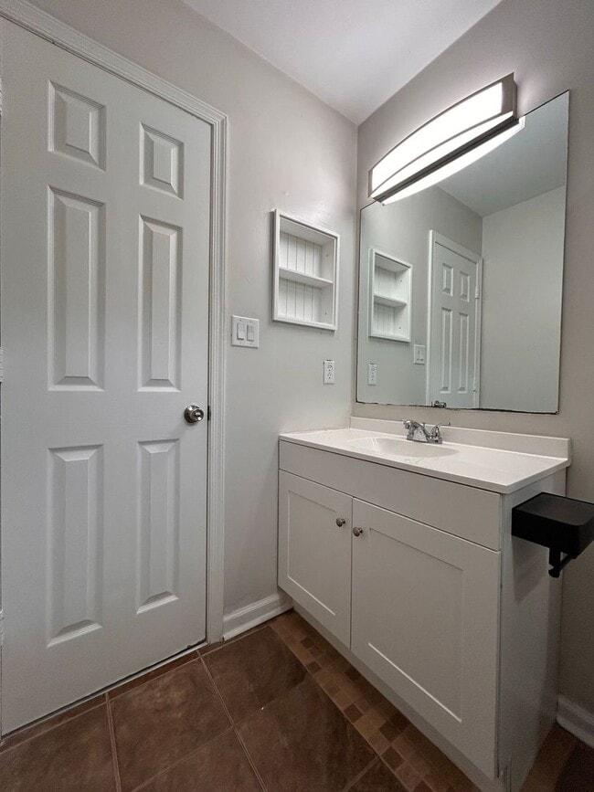 Building Photo - Spacious & Updated 4-Bedroom Gem in the He...