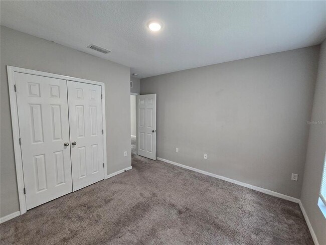 Building Photo - 5694 Arlington River Dr.