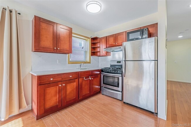 Building Photo - 220-09 64th Ave