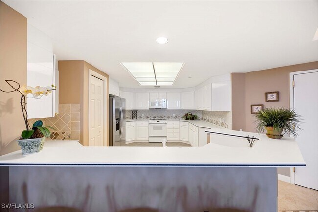 Building Photo - 7117 Pelican Bay Blvd