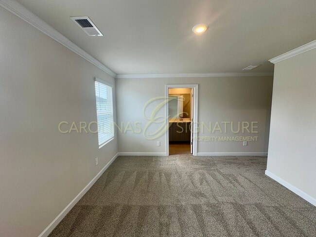 Building Photo - Beautiful New Construction Townhome in Uni...