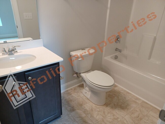 Building Photo - Built in 2022! 3 Story 3 Bedroom 1-Car Gar...
