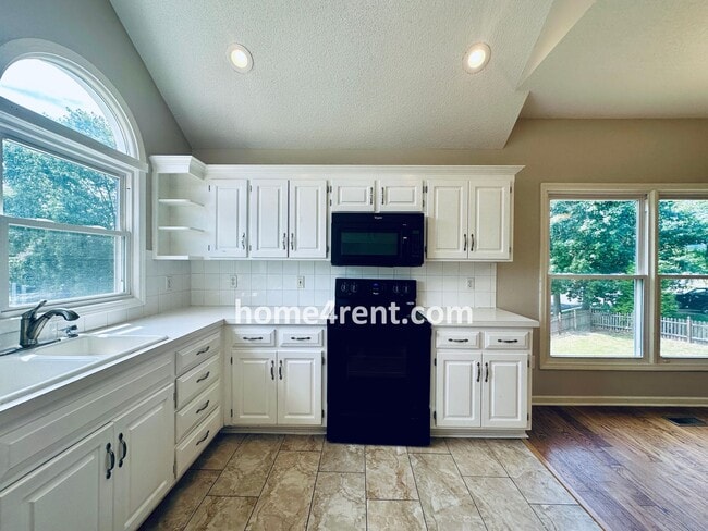 Building Photo - Brand New Paint, Wood Floors, Walkout Fini...