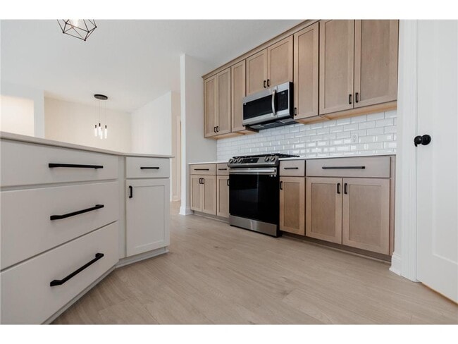 Building Photo - 13386 Fondant Trail N