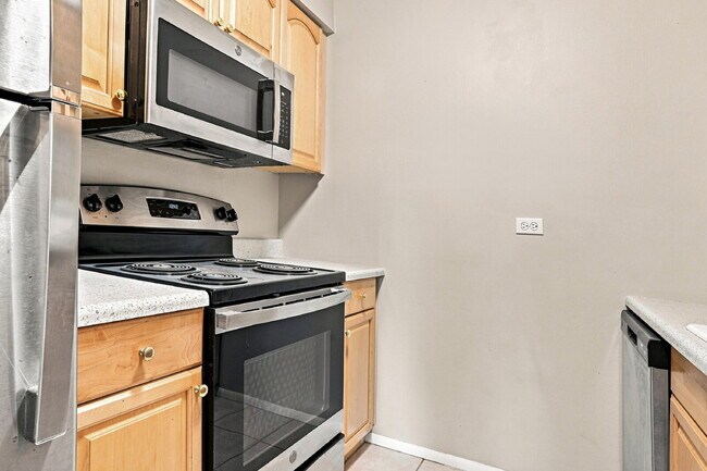Building Photo - $1,645.95 with Half Off The First Month's Rent, 2 Beds - 1 Bath, Condo in Denver with Central A/C!