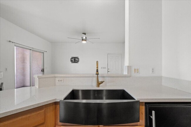 Building Photo - Charming 2-Bedroom First Floor Featuring Open Layout, Fireplace, Patio & Community Pool