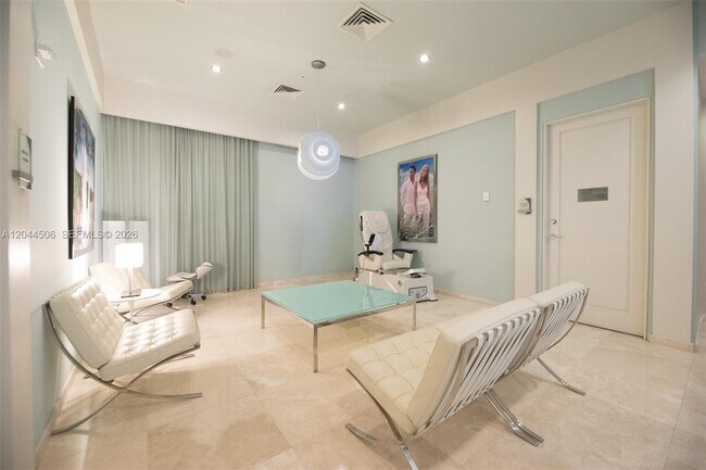 Building Photo - 10275 Collins Ave