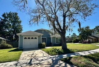 Building Photo - Cozy 3/2 Fenced Home on a Corner Lot