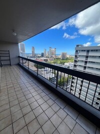 Building Photo - A/C. Ocean/City view. Covered Lanai. Swimm...