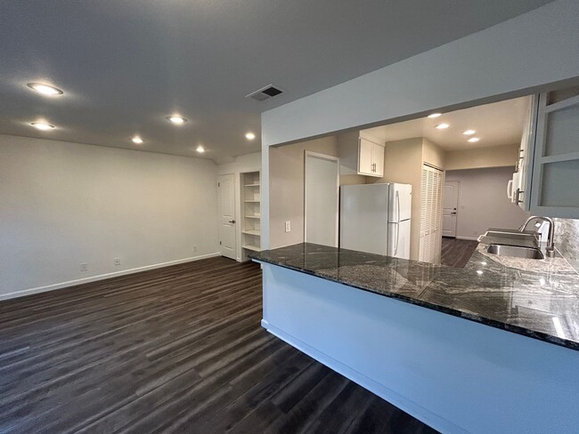 Building Photo - Move-In-Ready two-story townhome located o...