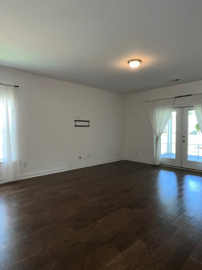 Building Photo - "Spacious 4-Bed Oasis with Stunning Lake V...