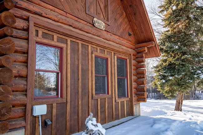 Building Photo - Charming Log Cabin and Carriage House – Do...
