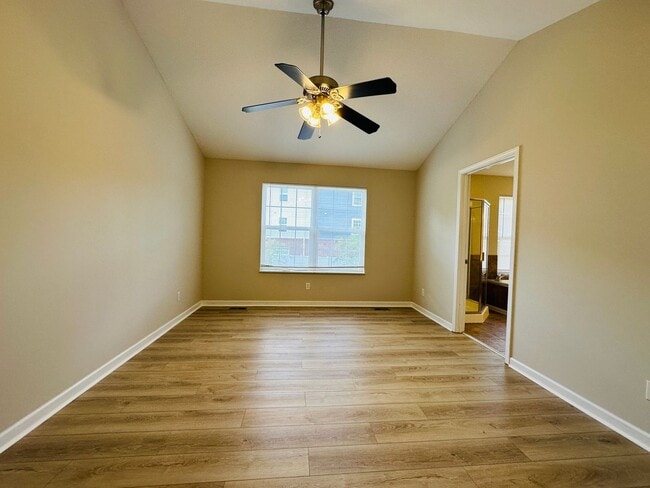 Building Photo - 2 bed, 2.5 bath updated townhouse w/ 1-car garage & Trex deck available now
