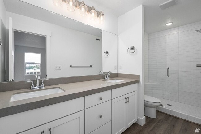 Building Photo - 3-bedroom, 2.5-bath townhome offering modern living in an unbeatable location.