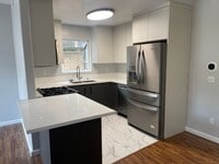 Building Photo - Updated Two Story Townhome w/ Two Car Garage