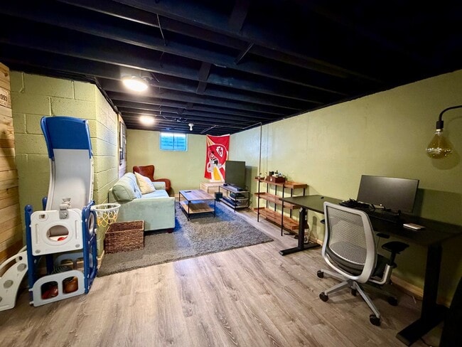 Building Photo - {7710} Prairie Village Split Level with Two Car Garage + Two Full Bathrooms + Hardwood Floors + U...