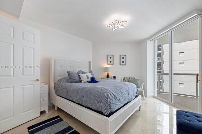 Building Photo - 18671 Collins Ave