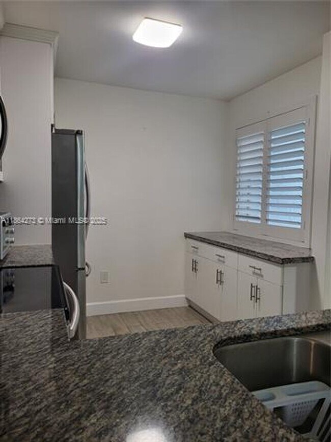Building Photo - 4555 NW 99th Ave