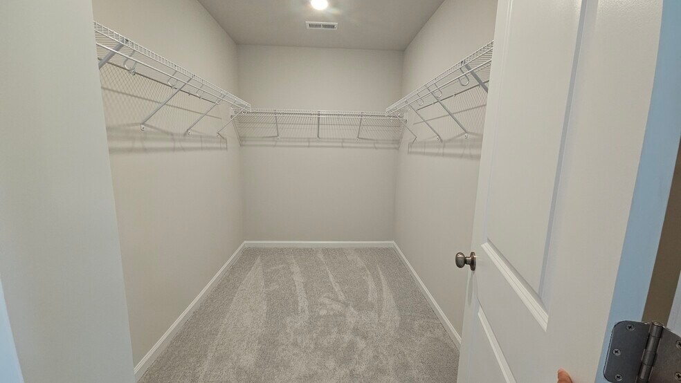 Large walk-in closet off of the main bedroom - 2207 Cape May Ln